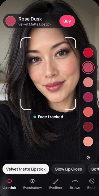 MakeUpTakeUp AR makeup camera with AI face tracking active on a woman's face